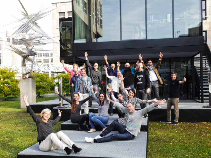 Team in front of Design Thinking Container at Daimler